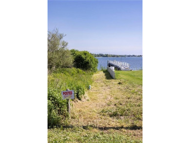 Nestled on desirable Harbour Island, this charming shingle-style - photo 6