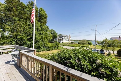 Nestled on desirable Harbour Island, this charming shingle-style - photo 8