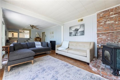 Nestled on desirable Harbour Island, this charming shingle-style - photo 9