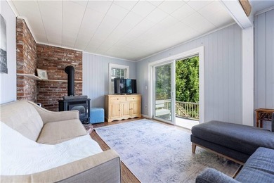 Nestled on desirable Harbour Island, this charming shingle-style - photo 10
