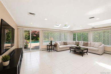 Welcome to this exceptional Hewlett residence, where timeless - photo 10