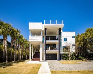 Nestled just steps from the Atlantic Ocean, this exceptional - photo 1