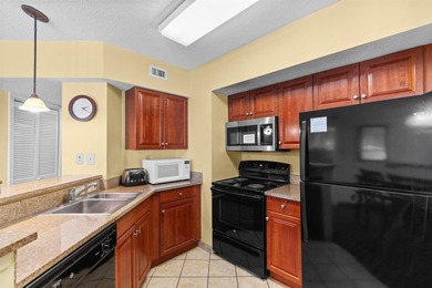 This beautifully furnished three bedroom Penthouse level unit at - photo 7