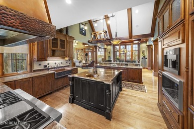 Custom built and located on a beautiful peninsula within the - photo 17