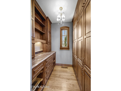 Custom built and located on a beautiful peninsula within the - photo 18