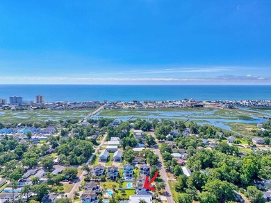 Beautifully updated Garden City beach home offering modern - photo 3