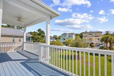 Beautifully updated Garden City beach home offering modern - photo 9