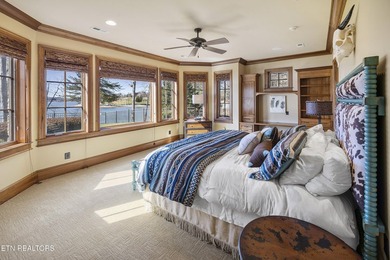 Custom built and located on a beautiful peninsula within the - photo 40