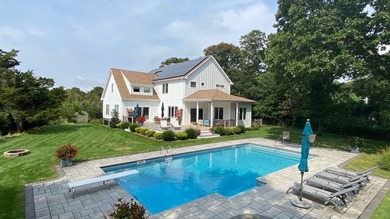 Nestled in a quiet residential enclave and surrounded by mature - photo 1