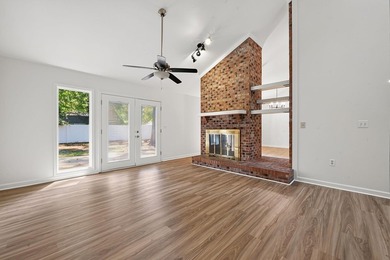 Three-bedroom, two-bathroom, single-story ranch home with a - photo 4