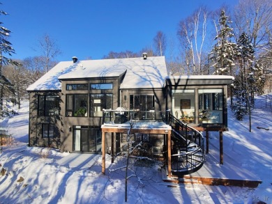 Lake Home For Sale in Saint-Sauveur, 