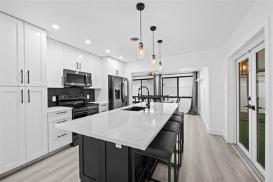 Beautifully updated 2BR/2BA corner home with a brand-new roof - photo 1