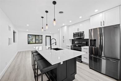 Beautifully updated 2BR/2BA corner home with a brand-new roof - photo 7
