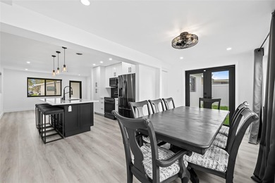 Beautifully updated 2BR/2BA corner home with a brand-new roof - photo 9