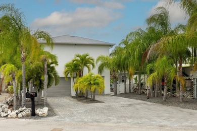 Stunning! Custom designed and built, elevated CBS home on a - photo 6
