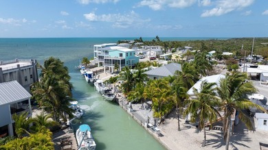 Stunning! Custom designed and built, elevated CBS home on a - photo 10