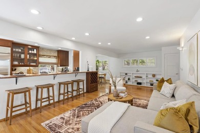 Experience the pinnacle of coastal living in this spacious North - photo 3