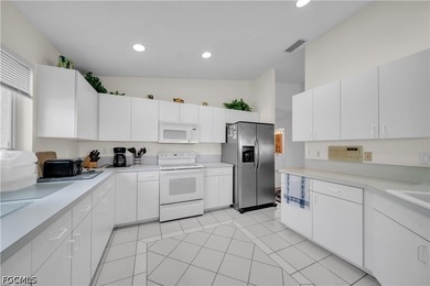 EXPERIENCE TRUE GOLF LIVING in this beautifully maintained - photo 3