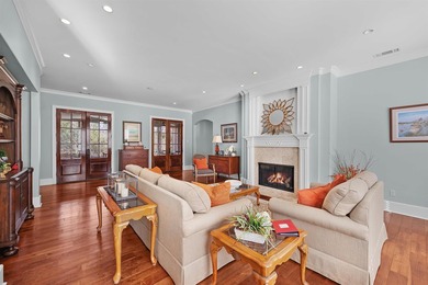 This elegant executive brick home offers luxury living and