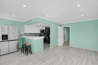 Experience refined island living in this newly remodeled - photo 5