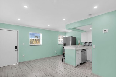 Experience refined island living in this newly remodeled - photo 7