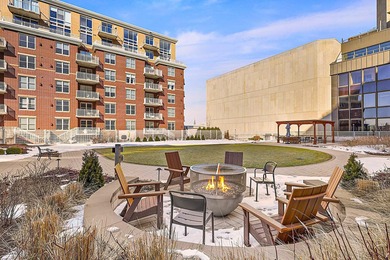 PRIME DOWNTOWN LOCATION WITH 2 ADJACENT PARKING SPACES!  Soak up