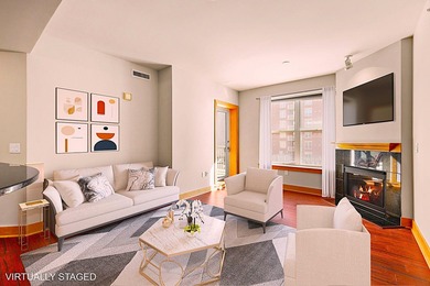 PRIME DOWNTOWN LOCATION WITH 2 ADJACENT PARKING SPACES!  Soak up