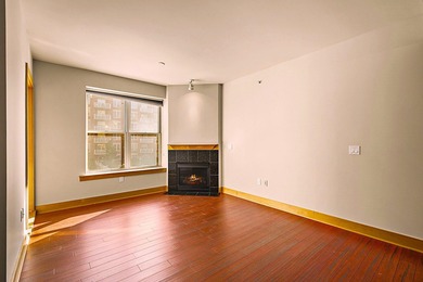 PRIME DOWNTOWN LOCATION WITH 2 ADJACENT PARKING SPACES!  Soak up