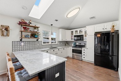 This beautifully updated 3-bedroom, 2-bath home offers both - photo 6