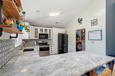 This beautifully updated 3-bedroom, 2-bath home offers both - photo 7