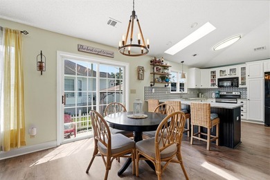 This beautifully updated 3-bedroom, 2-bath home offers both - photo 8
