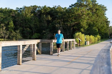 Located on a cul-de-sac in the Jericho Woods neighborhood of