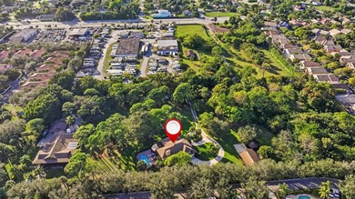 Situated on a rare 3.4-acre residential parcel in Delray Beach - photo 5