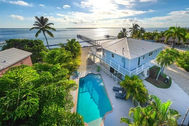 Welcome to an exquisite open-water retreat in Big Pine Key, an - photo 1