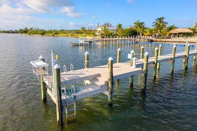 Welcome to an exquisite open-water retreat in Big Pine Key, an - photo 5