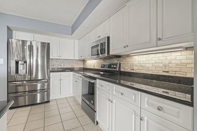 Welcome to Yacht Club Villas in the highly sought-after Barefoot - photo 9