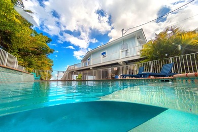 Welcome to an exquisite open-water retreat in Big Pine Key, an - photo 9