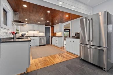 Imagine a cozy 4-bedroom, 2 bath main lodge, plus 2 charming - photo 4