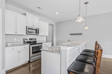 Welcome to this immaculate, move-in-ready four-bedroom, two full - photo 9