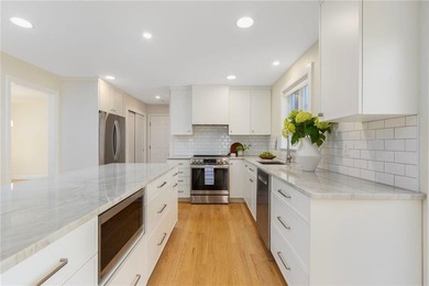 Located in the desirable Island Drive neighborhood, this - photo 3