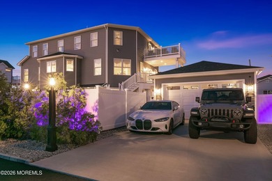Located on the desirable Cove Road in Toms River sits a home fit - photo 3