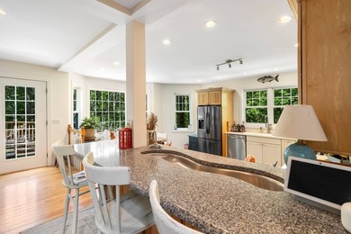 Nestled on the edge of Sag Harbor Village within the celebrated - photo 4