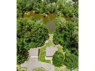 This beautiful lakefront home on over an acre features an open - photo 1