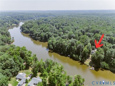 This beautiful lakefront home on over an acre features an open - photo 2