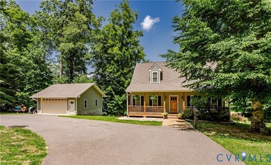 This beautiful lakefront home on over an acre features an open - photo 3