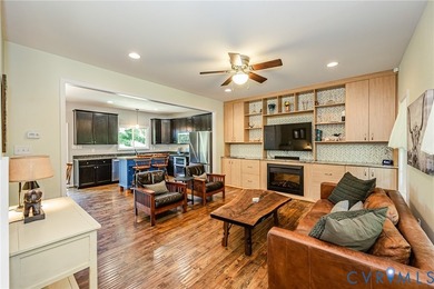 This beautiful lakefront home on over an acre features an open - photo 9