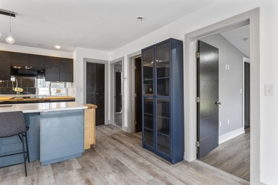 variety of lifestyles. The bright, inviting kitchen and - photo 14