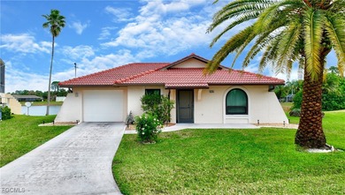 Lake Home For Sale in Lehigh Acres, Florida