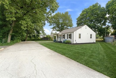 Nestled on a picturesque wooded lot at the end of a quiet - photo 3