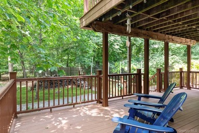 On a private, scenic, .98-acre lot in East Hampton Village - photo 14